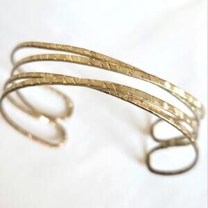 Gold Tone Crossed Cuff Bracelet